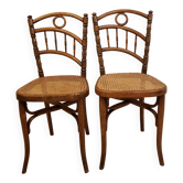Paires d'anciennes chaises bistrot cannées cambier n°229