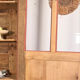 Antique glass-fronted terracotta cupboard