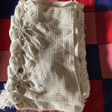 White cotton crochet bed cover with squares
