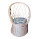 Vintage shell chair in woven rattan with original cushion.