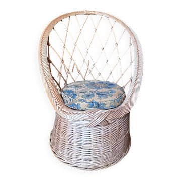 Fauteuil coquille vintage en rotin tressé avec coussin d'origine