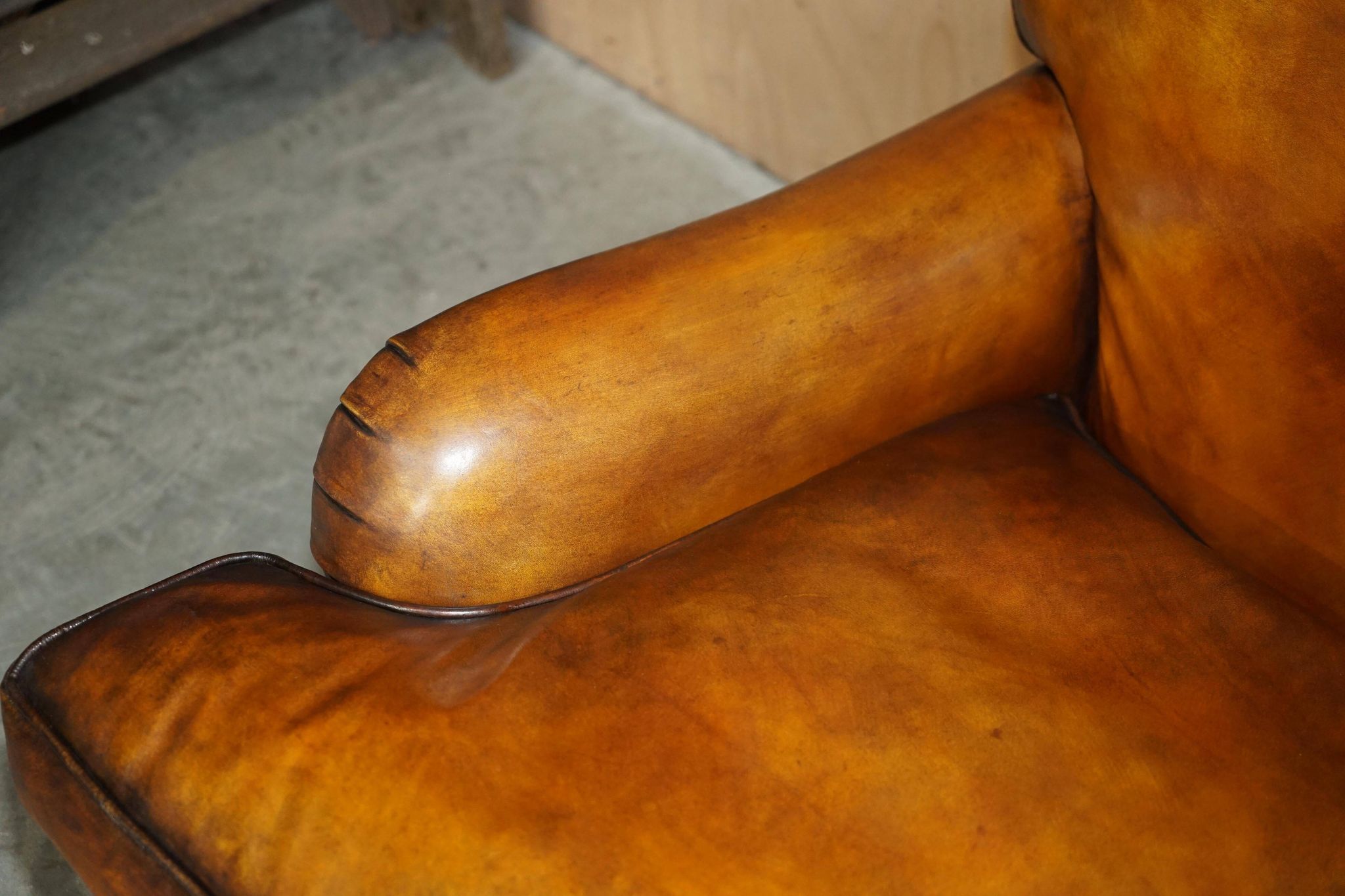 Howard & Son restored leather canapé, width 145 cm