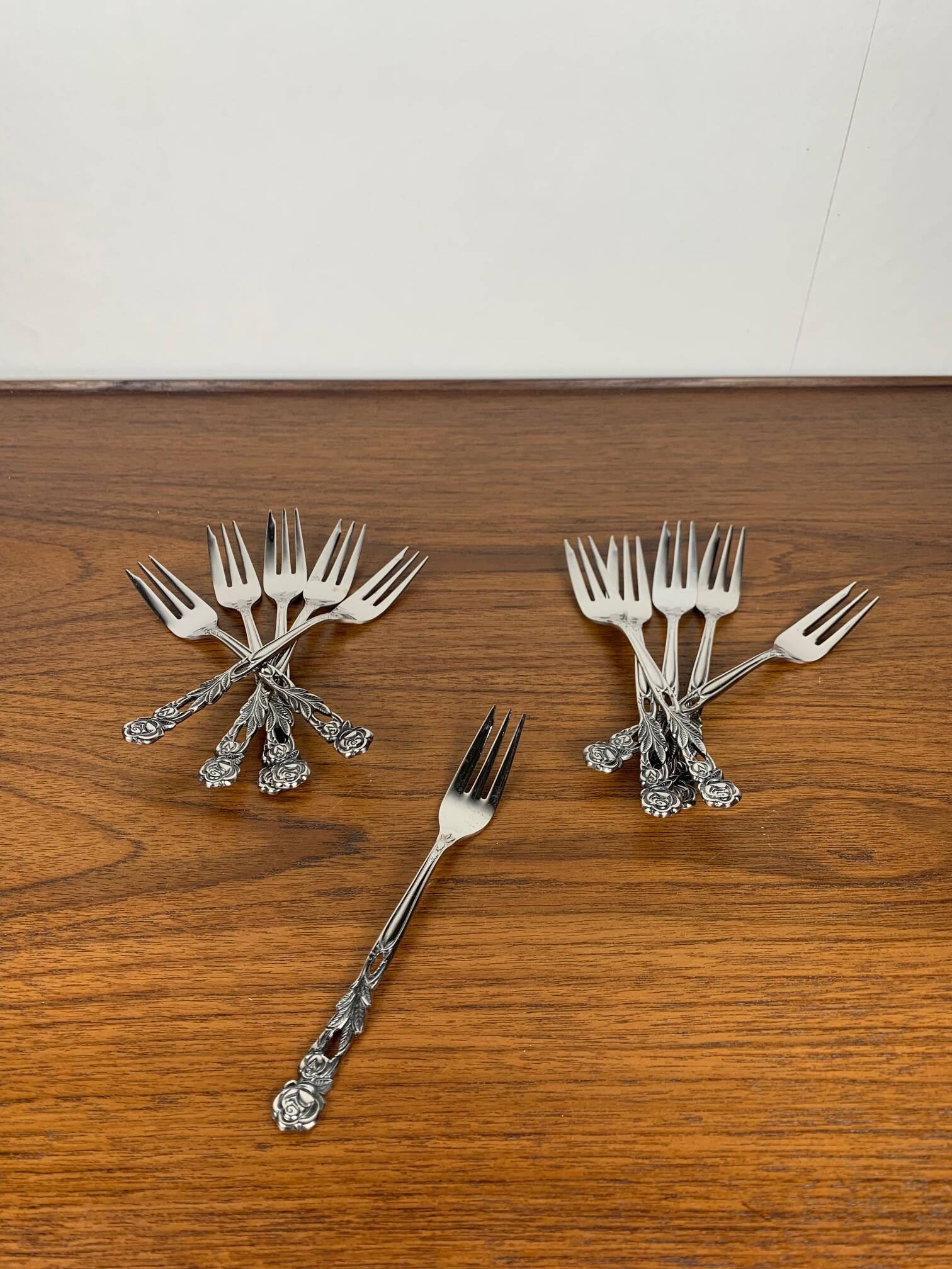 Set of 10+1 Japanese stainless steel dessert forks, rose pattern, 1970