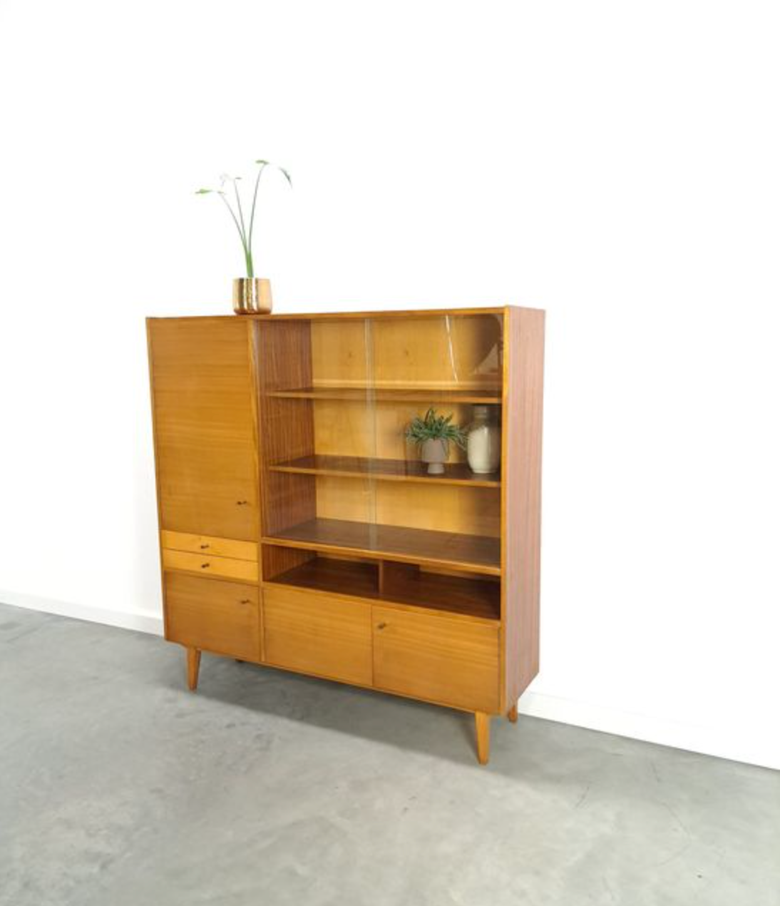Vintage wooden sideboard with sliding glass doors and drawers
