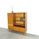 Vintage wooden sideboard with sliding glass doors and drawers