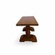A small, rustic walnut wooden table, crafted from solid walnut wood, 1