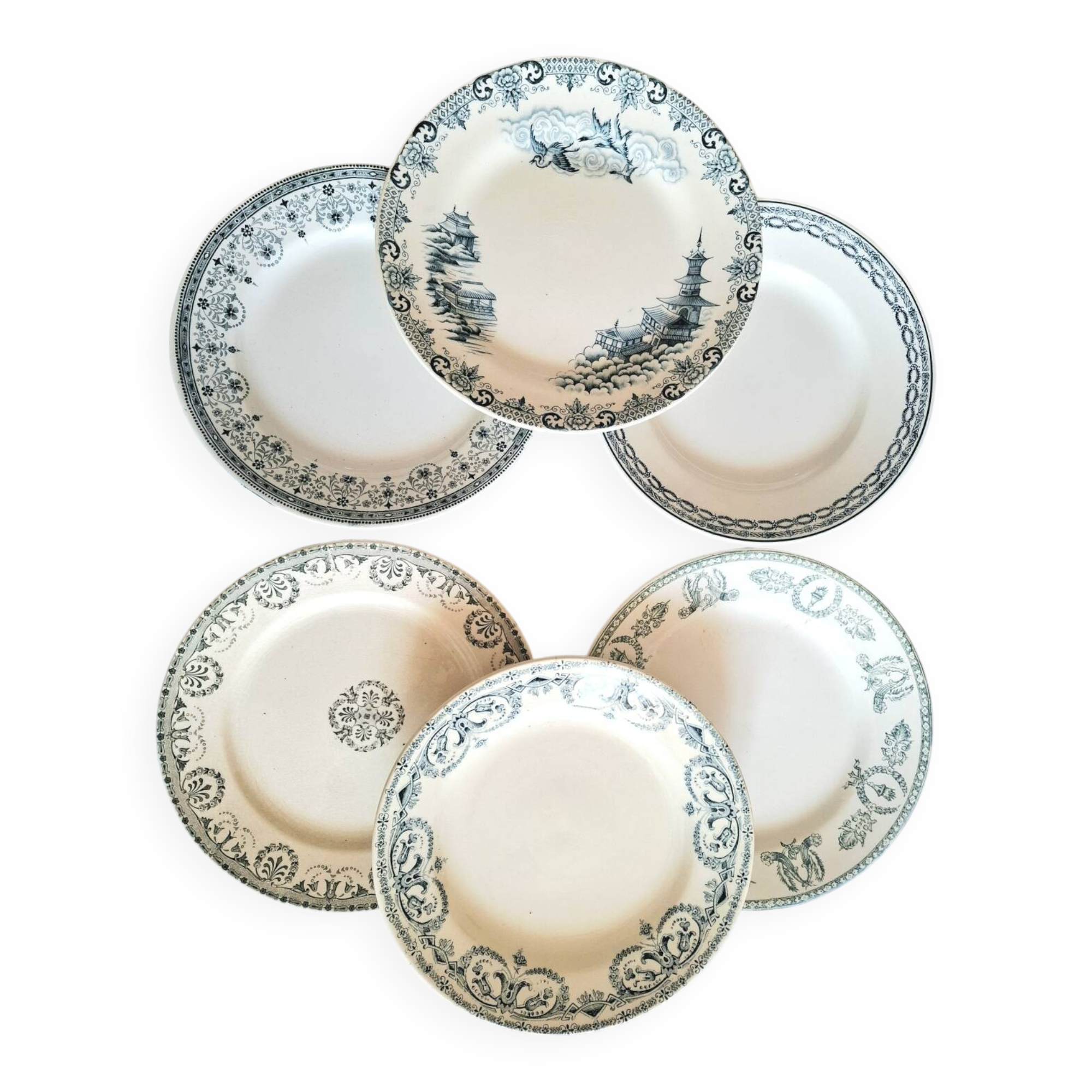 Mismatched antique ironstone earthenware plates