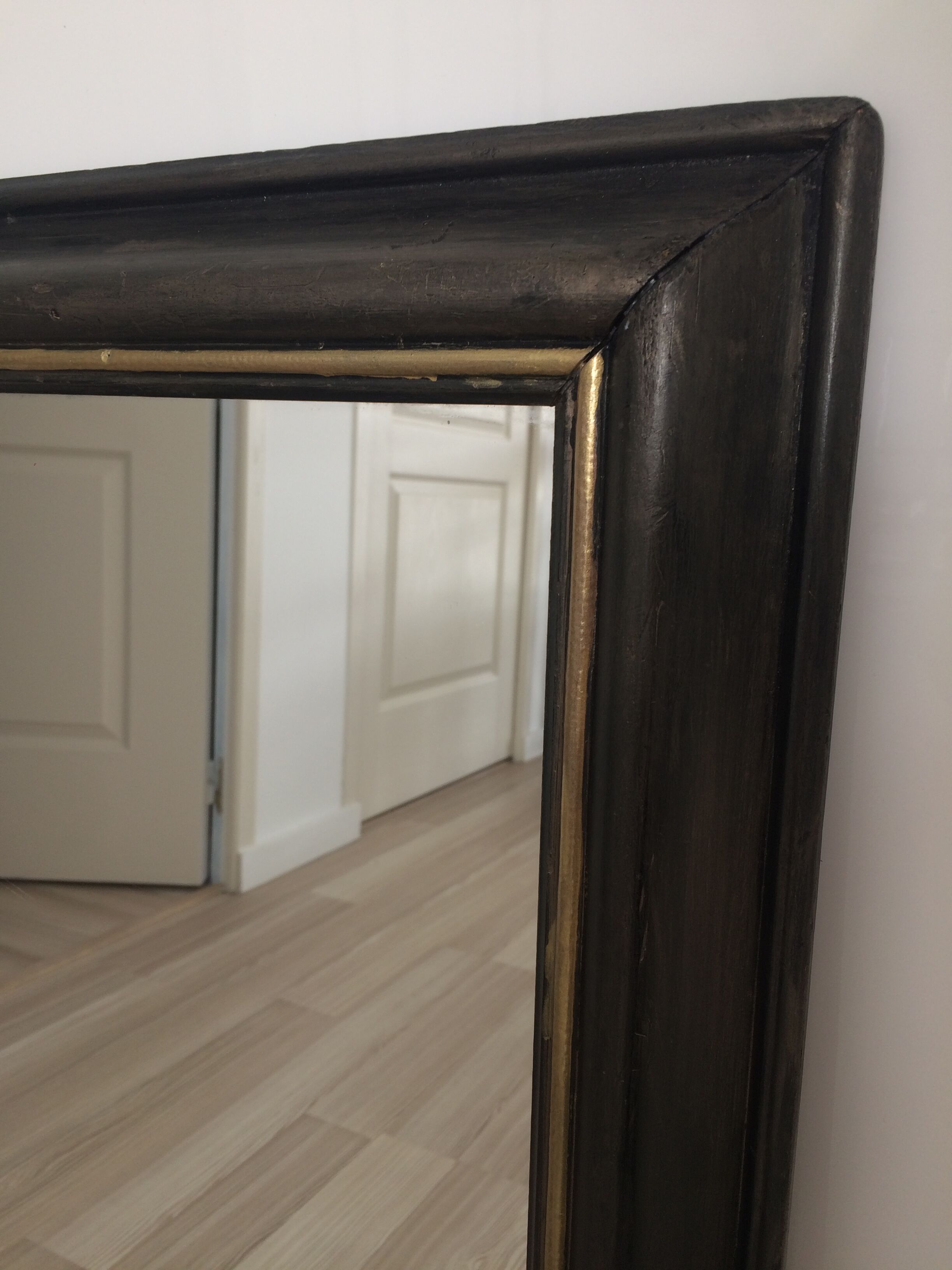 Former mirror black with gold edging 62x82cm
