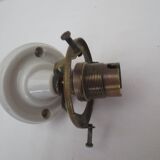 Wall light at 45° and its very elaborate frosted glass tulip