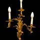 Pair of gilded bronze wall sconces in Rococo style, three lights.