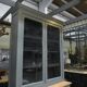 Buffet  Bibliothèque à 2 corps en sapin patiné gris
