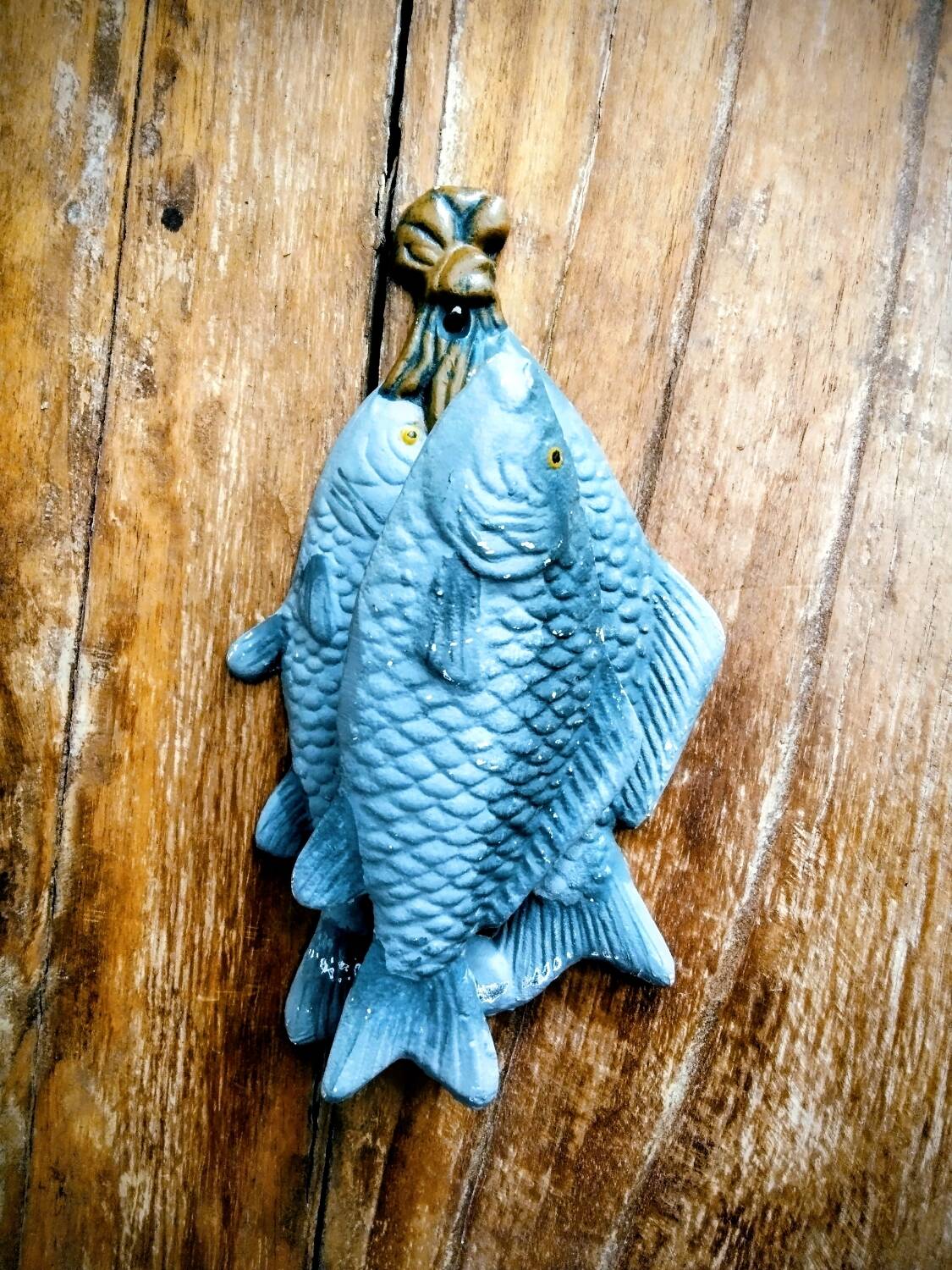 Heurtoir en fonte trio de poissons