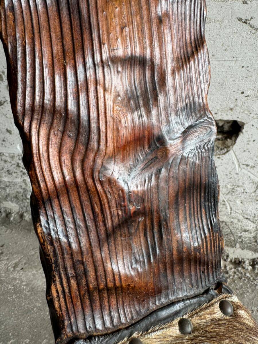Pair of 1950s Spanish carved solid wood chairs with beige cowhide leather seats