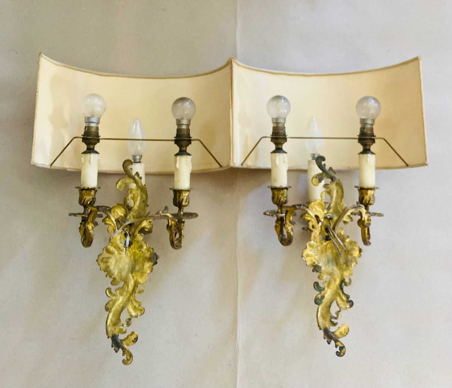 Louis XV gilt bronze wall lights from the 19th century with lampshades