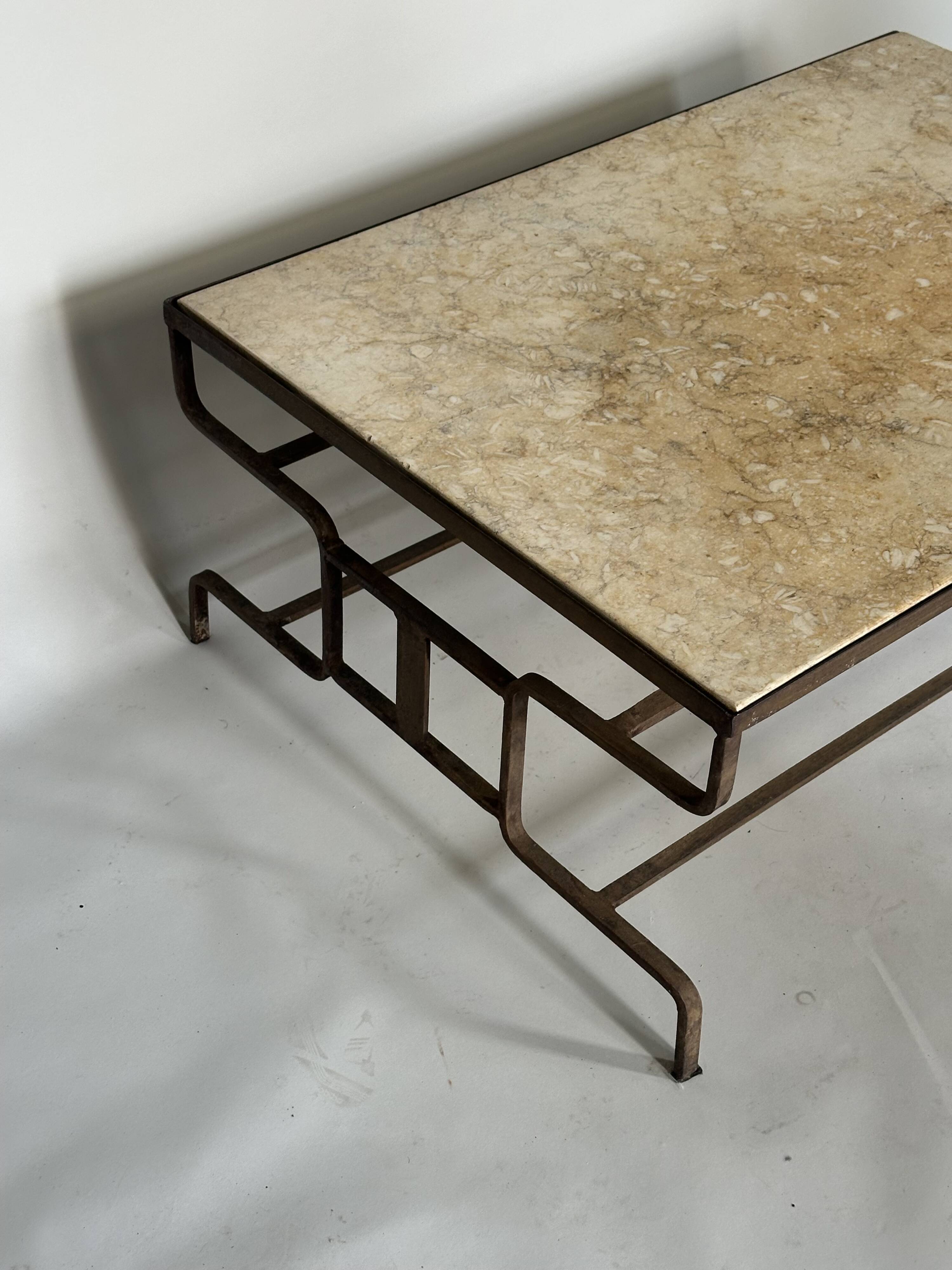 French handcrafted coffee table in travertine and wrought iron, 1920s.