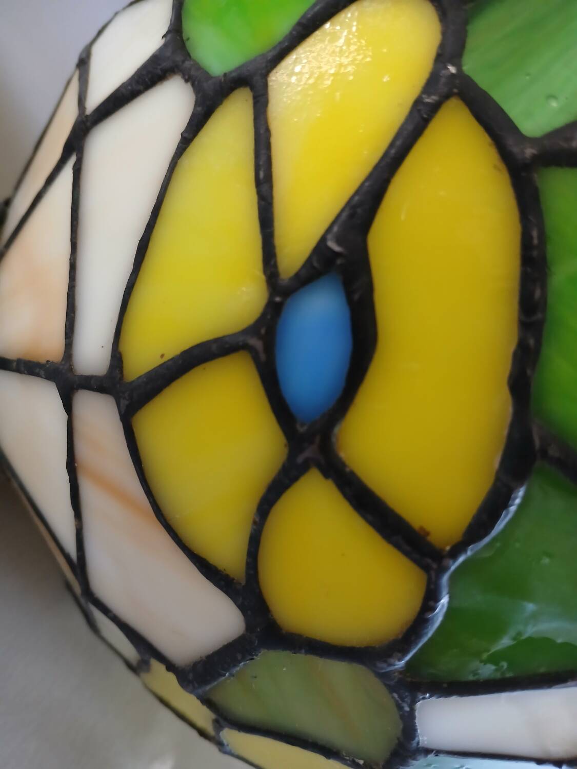 Antique stained glass and tin pendant light