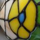Antique stained glass and tin pendant light