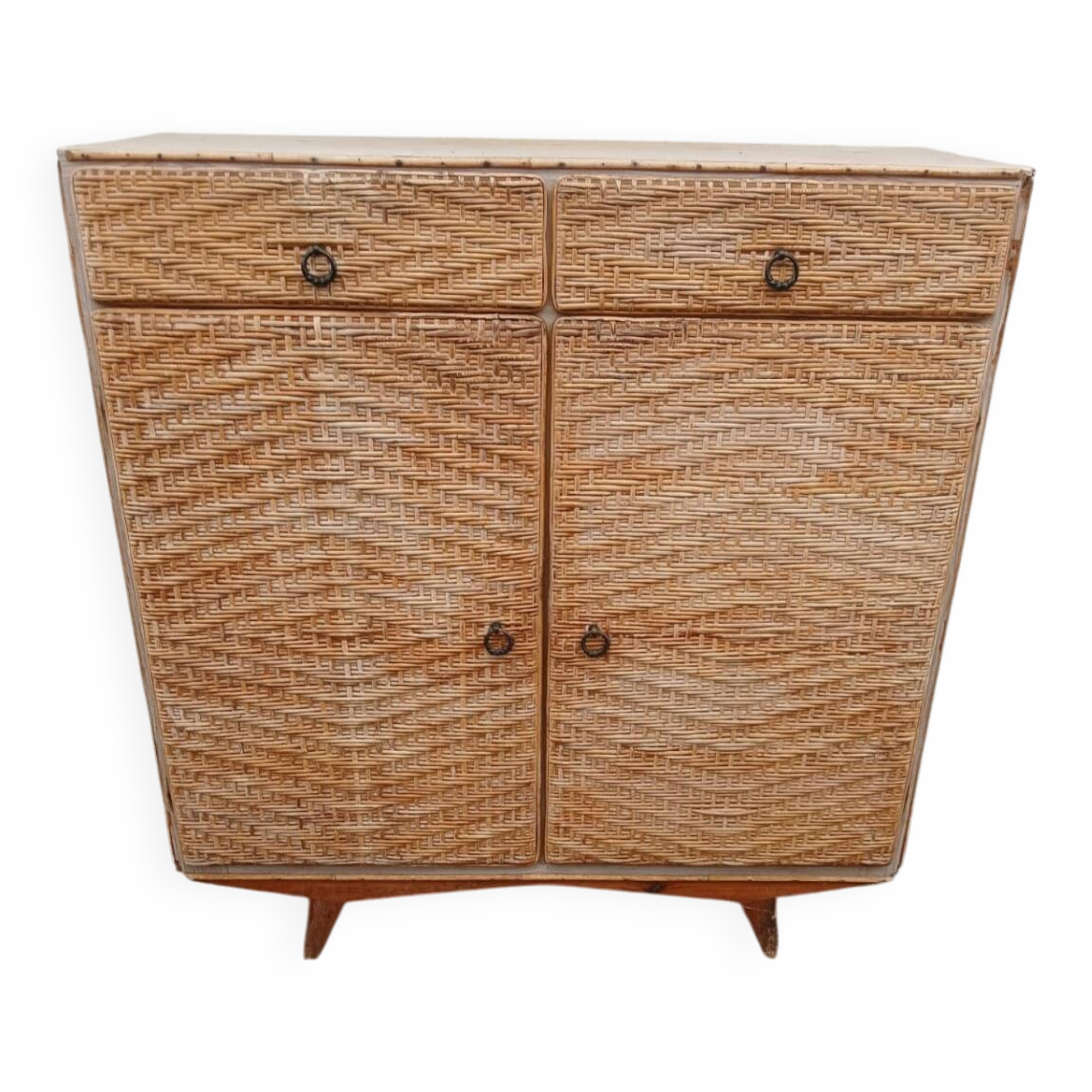Vintage woven rattan furniture with tapered legs.