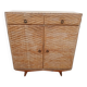 Vintage woven rattan furniture with tapered legs.