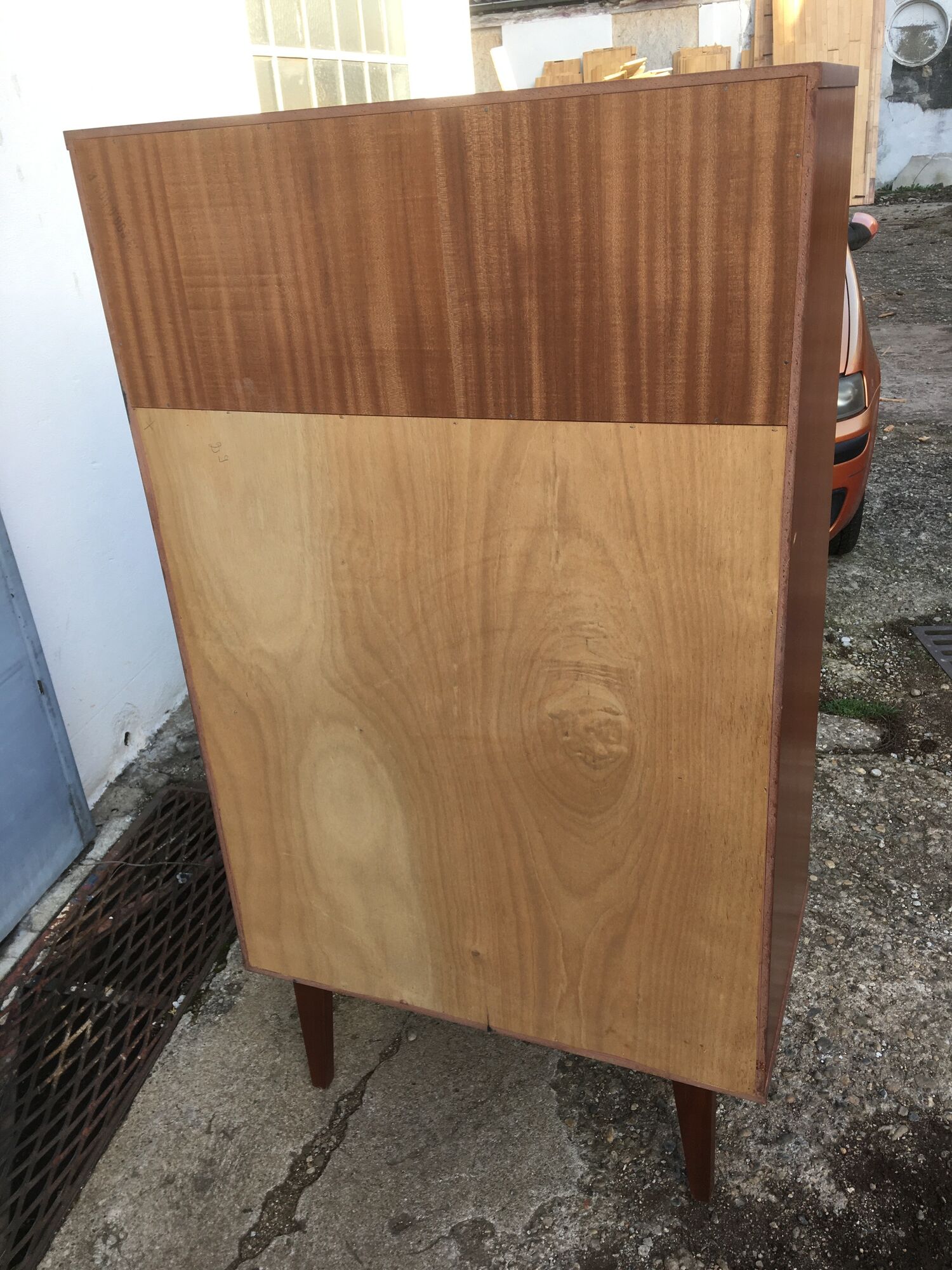 Vintage secretary with wooden compass feet with felling, shop window and closet