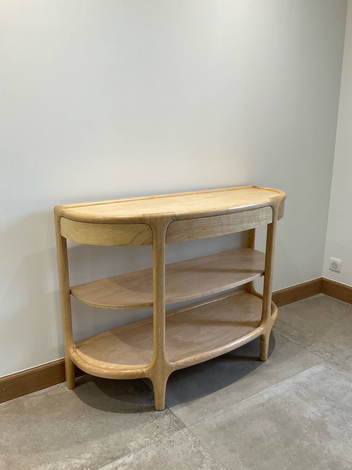 Contemporary console in ash wood.