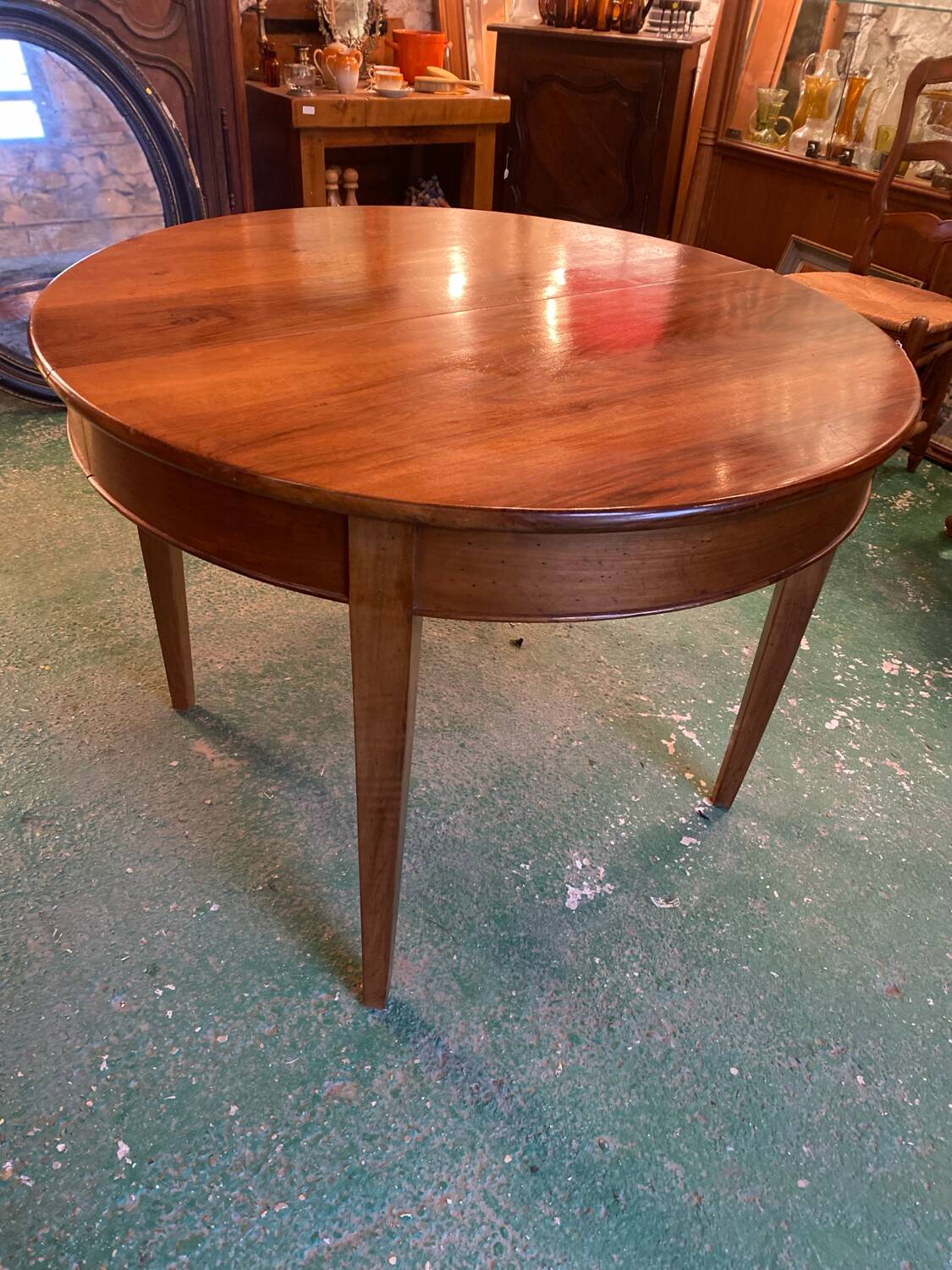 Louis XVI style oval walnut extendable table