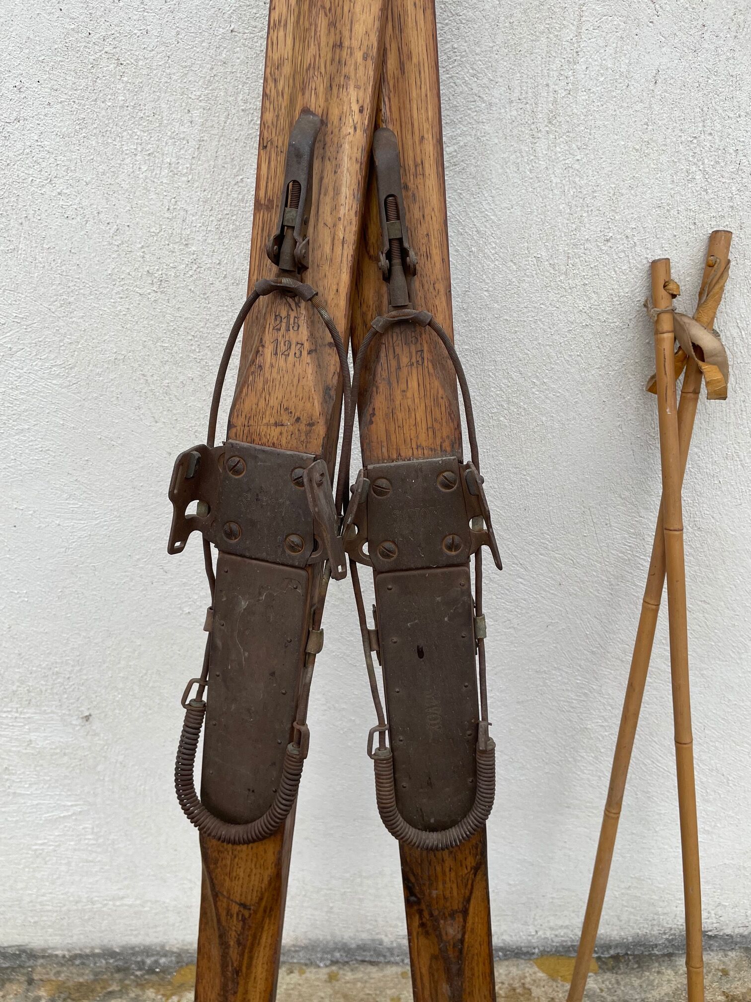 Wooden ski and its sticks