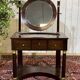 Empire hairdresser from the 19th century in mahogany with a marble top.