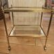 Rolling dessert trolley in gilded brass style Jansen