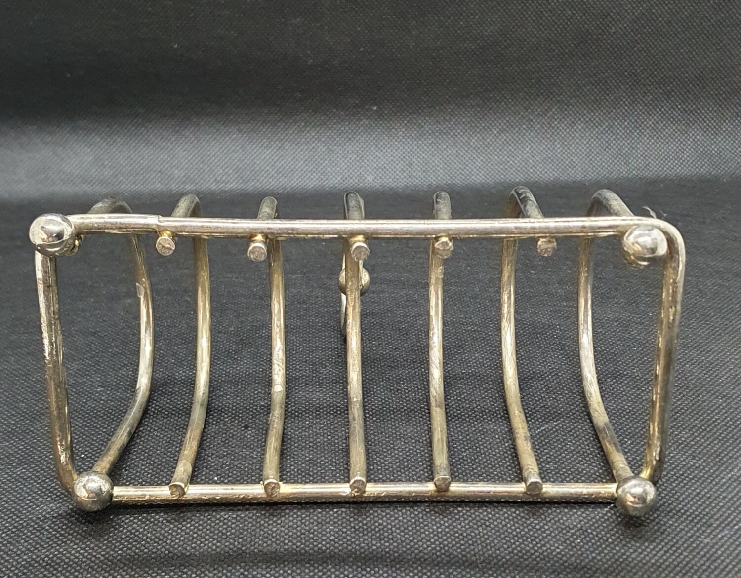 Toast holder in silver metal