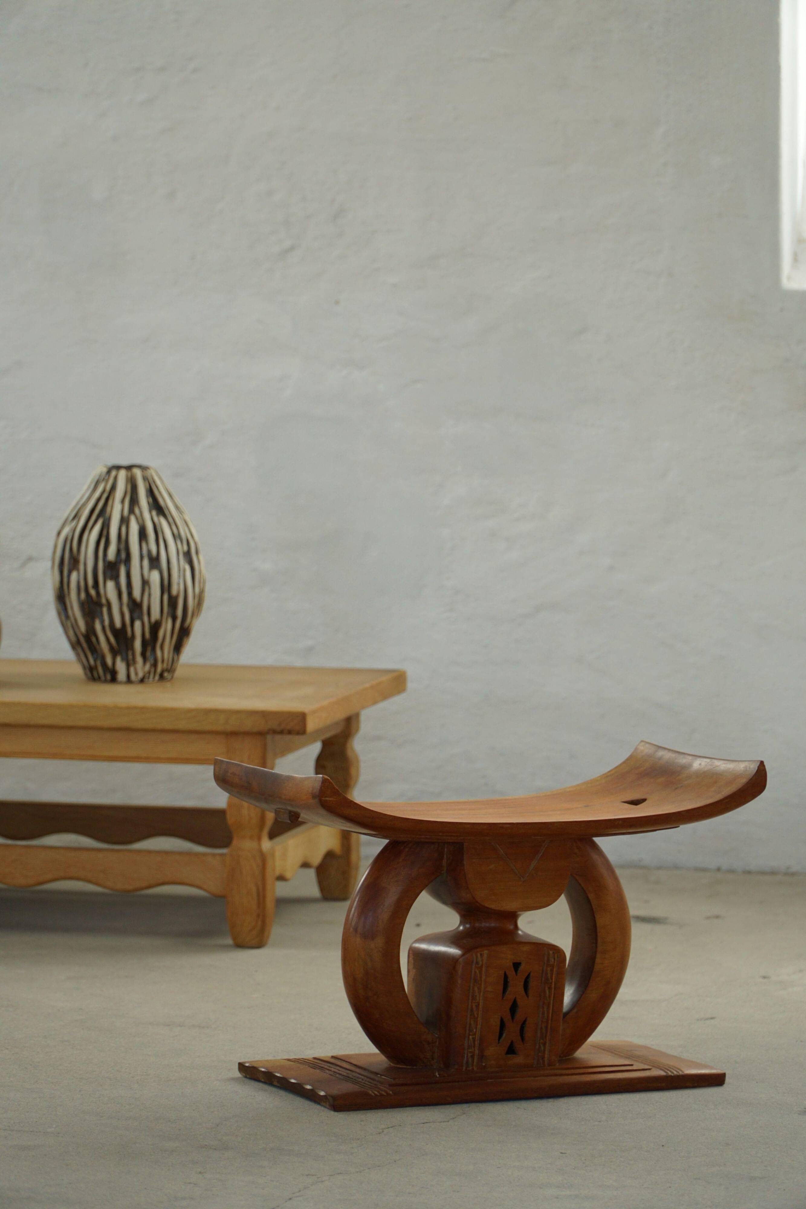 Ashanti stool from West Africa, carved from hardwood, 20th century.