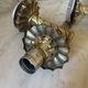 Pair of neoclassical wall sconces in twisted brass and ribbed glass.