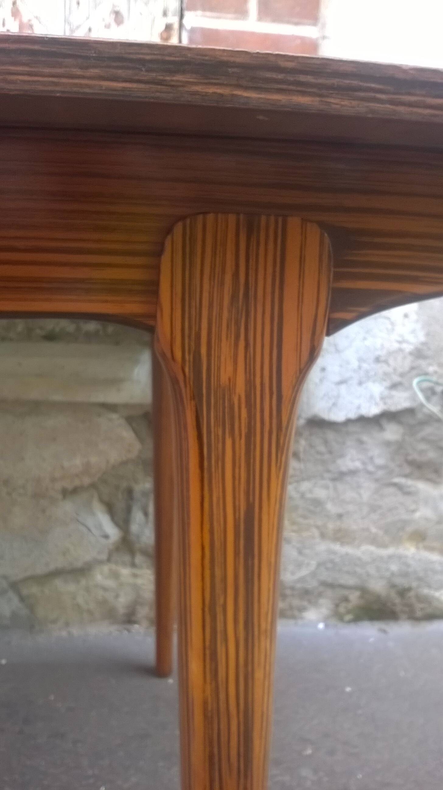 Extendable teak dining table
