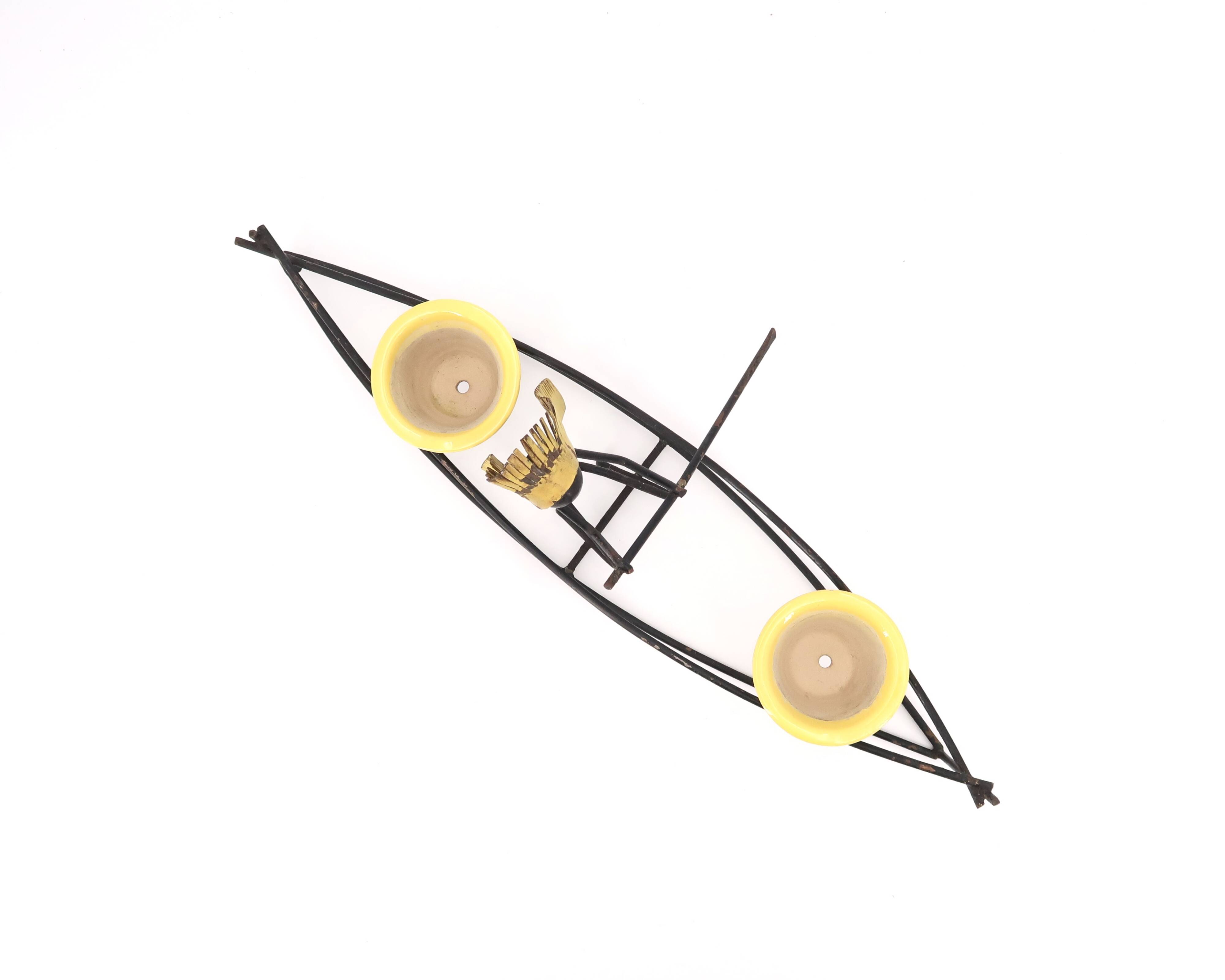 Ceramic flower pot in dugout with Indian, 1950s