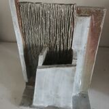 Architecture vase in raw sandstone
