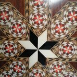 Old oriental plateau in marquetry.