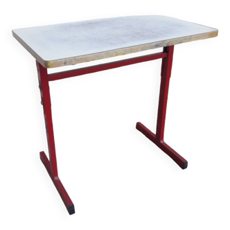 School desk with adjustable feet.