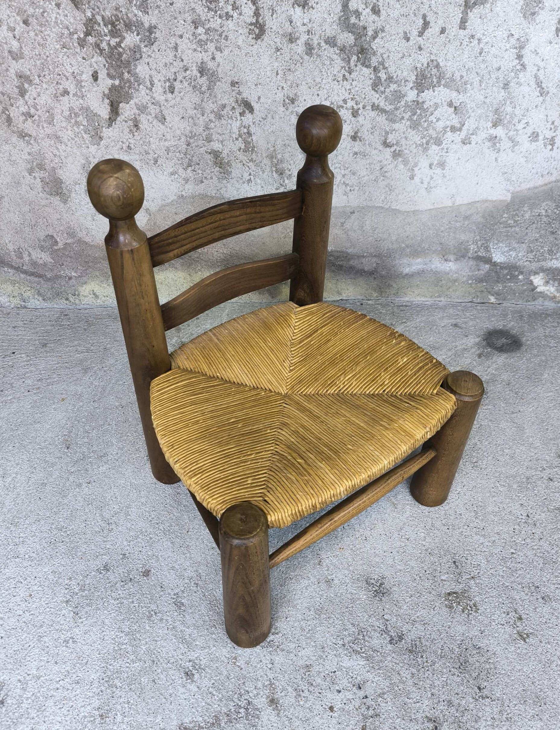 Vintage low chair in wood and straw
