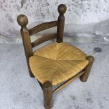 Vintage low chair in wood and straw