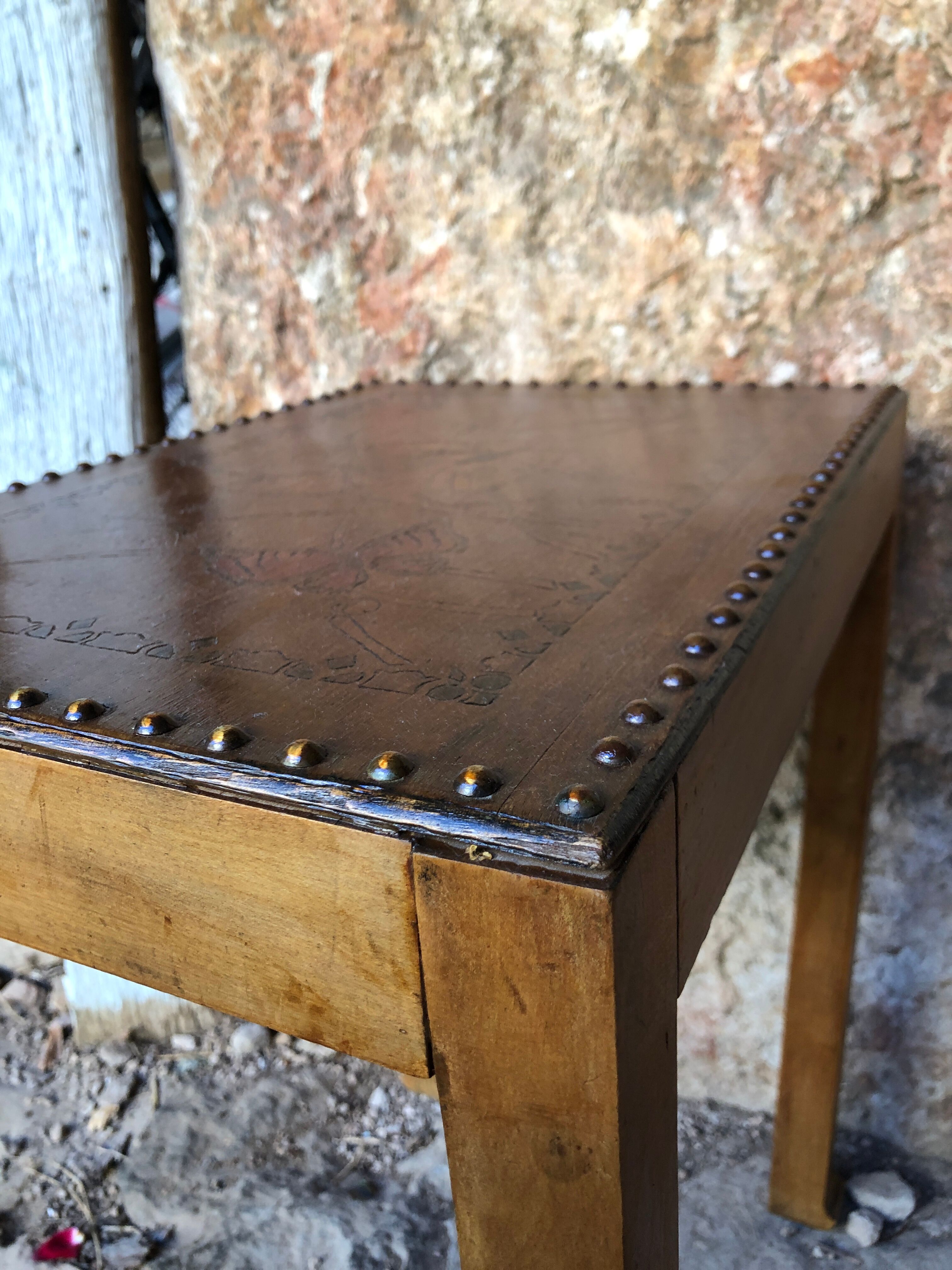 Pair of studded nesting tables from the 1930s.