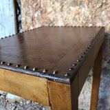 Pair of studded nesting tables and 1930