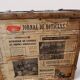 Vintage wooden and metal green travel trunk, circa 1930.