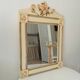 Vintage bohemian mirror from the 80s in carved wood.