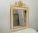 Vintage bohemian mirror from the 80s in carved wood.