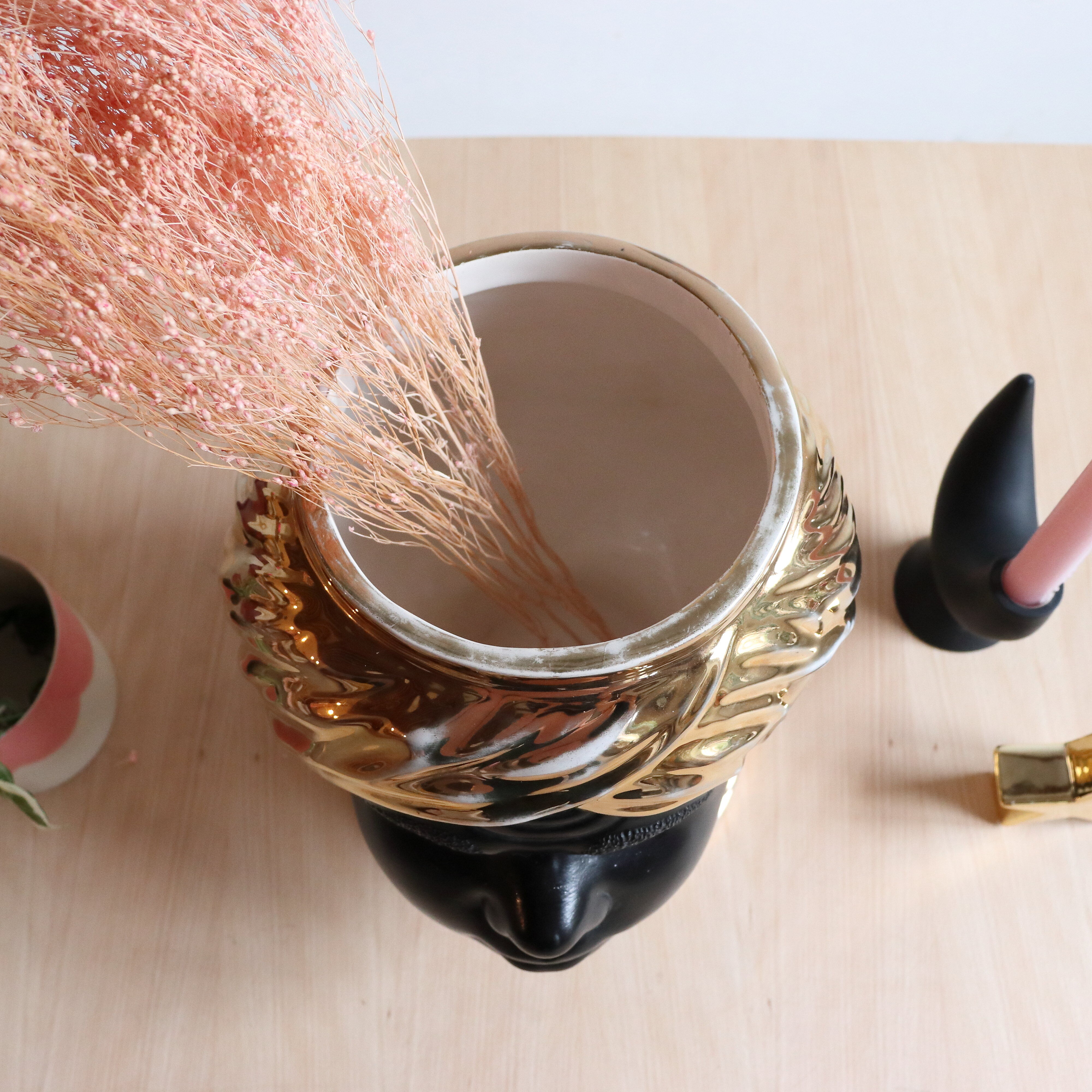 Black and gold Italian ceramic head vase signed Behreno