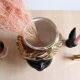 Black and gold Italian ceramic head vase signed Behreno