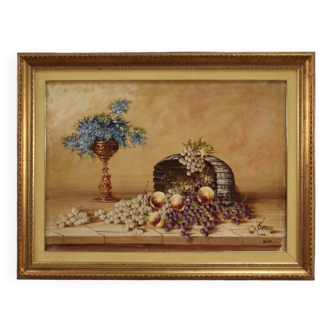 Tableau signé nature morte aux fleurs et fruits du 20ème siècle