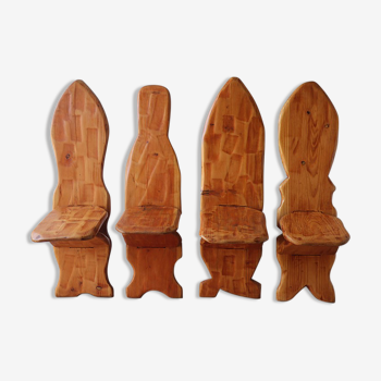 Series of 4 brutalist chairs carved in solid pine 1970