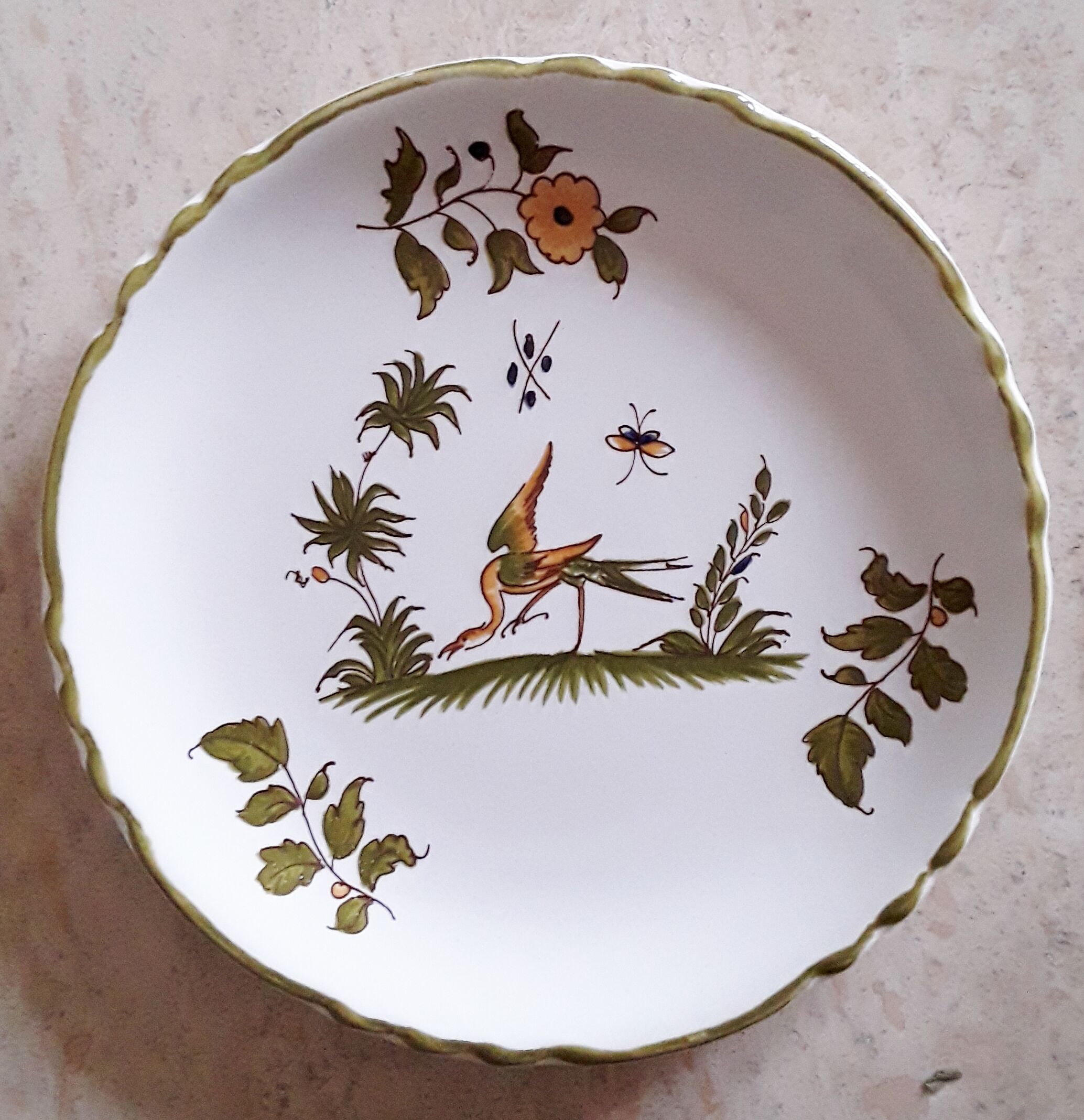 Lot of three small dessert plates decorated "Moustiers"