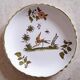 Lot of three small dessert plates decorated "Moustiers"